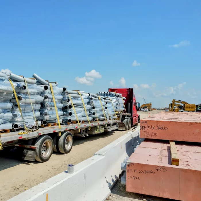 Truckload 6 inch PVC sweeps on job site